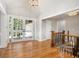 Foyer with hardwood floors and stairway at 9025 Huntcliff Trce, Atlanta, GA 30350