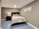 Cozy bedroom with a neutral palette, featuring a comfortable bed and a minimalist design at 998 Poplar Mill Ct, Buford, GA 30518