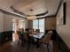 Nicely decorated dining room with seating for six and elegant decor at 998 Poplar Mill Ct, Buford, GA 30518