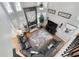 Living room featuring high ceilings, fireplace, hardwood floors, and modern decor at 998 Poplar Mill Ct, Buford, GA 30518