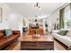 Inviting living room boasts hardwood floors, an open layout, and lots of natural light at 1001 Starmoss Ln, Conyers, GA 30094