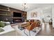 Comfortable living room with a fireplace, modern decor, and open layout at 1001 Starmoss Ln, Conyers, GA 30094
