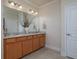 Bathroom featuring double sinks, granite countertops, tile floors and great lighting at 2871 Goldfinch Cir, Marietta, GA 30066