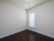 A simple, yet comfortable bedroom with hardwood floors and plantation shutters at 2871 Goldfinch Cir, Marietta, GA 30066
