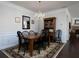 Elegant dining room with a wooden table, chandelier, hardwood floors, and traditional decor at 2871 Goldfinch Cir, Marietta, GA 30066