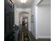 Inviting foyer with dark wood floors, elegant wainscoting, and a view of the living area at 2871 Goldfinch Cir, Marietta, GA 30066