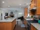 Spacious kitchen featuring granite countertops, modern appliances, and hardwood flooring at 2871 Goldfinch Cir, Marietta, GA 30066