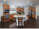 Bright kitchen with stainless appliances, granite countertops, island and hardwood floors at 2871 Goldfinch Cir, Marietta, GA 30066