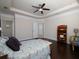Charming main bedroom with hardwood floors, tray ceilings and great natural light at 2871 Goldfinch Cir, Marietta, GA 30066