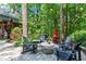 Outdoor patio with comfortable seating, perfect for entertaining guests at 4686 Buckskin Sw Trl, Lilburn, GA 30047