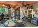 Back porch with wood ceiling, ceiling fan, outside furniture and grill, perfect for outdoor living at 4686 Buckskin Sw Trl, Lilburn, GA 30047