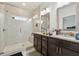 Bathroom featuring granite countertops, tile flooring, and enclosed shower at 2161 Colvin Ct, Atlanta, GA 30318
