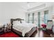 Bedroom with carpet, natural light, and a ceiling fan at 2161 Colvin Ct, Atlanta, GA 30318