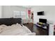 Bedroom with hardwood floors, two windows, and neutral paint at 2161 Colvin Ct, Atlanta, GA 30318