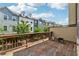 Private deck with wood railing provides outdoor living space and room for a grill at 2161 Colvin Ct, Atlanta, GA 30318