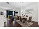Open concept living and dining room featuring hardwood floors, recessed lighting, and stylish decor at 2161 Colvin Ct, Atlanta, GA 30318