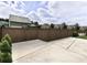 An inviting backyard with extended patio and privacy fence provides ample space for outdoor enjoyment at 416 Blue Sky Cir, Acworth, GA 30102