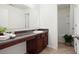 Bathroom featuring a vanity with counter space, a sink, and a bathtub/shower, perfect for relaxation at 416 Blue Sky Cir, Acworth, GA 30102