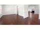 Open-concept space showing dining room adjacent to living area, with hardwood floors at 416 Blue Sky Cir, Acworth, GA 30102