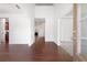 Bright foyer features beautiful hardwood floors, wainscoting, and tall ceilings at 416 Blue Sky Cir, Acworth, GA 30102