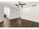 Spacious primary bedroom features wood-look floors and ample natural light at 534 Woodcrest Manor Dr, Stone Mountain, GA 30083