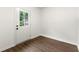 Bright room features wood-look flooring and an exterior door with glass panels at 534 Woodcrest Manor Dr, Stone Mountain, GA 30083