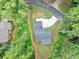 An aerial shot of a home with a well-manicured lawn, driveway, and surrounding trees at 331 Terrell Sw Dr, Marietta, GA 30064
