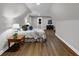 Spacious bedroom with hardwood floors, neutral walls, and a sloped ceiling at 331 Terrell Sw Dr, Marietta, GA 30064