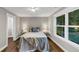 Inviting bedroom featuring ample natural light and hardwood floors plus an adjacent walk-in closet at 331 Terrell Sw Dr, Marietta, GA 30064