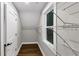 Walk-in closet with a window and built-in shelving at 331 Terrell Sw Dr, Marietta, GA 30064