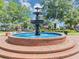 A beautiful fountain surrounded by lush greenery, providing a relaxing community gathering spot at 331 Terrell Sw Dr, Marietta, GA 30064
