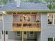Cozy outdoor deck with a dining table, chairs, and access to walkout basement at 331 Terrell Sw Dr, Marietta, GA 30064