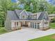 New construction home featuring a three-car garage, lovely curb appeal, and a modern design at 331 Terrell Sw Dr, Marietta, GA 30064
