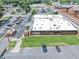 Aerial view of a food hall, large parking lot, and outdoor patio seating area at 331 Terrell Sw Dr, Marietta, GA 30064