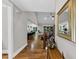 Open foyer with hardwood floors, view of staircase and kitchen, creating a spacious and inviting entrance to the home at 331 Terrell Sw Dr, Marietta, GA 30064