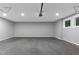 Spacious garage with concrete floors, overhead lighting, and gray walls at 331 Terrell Sw Dr, Marietta, GA 30064
