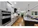 Spacious open kitchen with stainless appliances, an island, and modern cabinets at 331 Terrell Sw Dr, Marietta, GA 30064