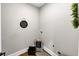 Neutral laundry room with gray walls and a basket at 331 Terrell Sw Dr, Marietta, GA 30064