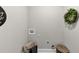 Bright laundry room with a green decorative wreath and two woven baskets at 331 Terrell Sw Dr, Marietta, GA 30064