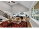 Bright, open living space showcasing the kitchen and grand staircase at 331 Terrell Sw Dr, Marietta, GA 30064