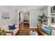 Inviting living room featuring hardwood floors, stylish furniture, and a charming entryway at 331 Terrell Sw Dr, Marietta, GA 30064