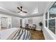 Spacious main bedroom with hardwood floors, recessed lighting, and a sitting area with wooded view at 331 Terrell Sw Dr, Marietta, GA 30064