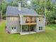 The home features a rear deck and a walk-out basement with a well-maintained lawn at 331 Terrell Sw Dr, Marietta, GA 30064