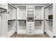 Walk-in closet featuring custom built-in shelving and drawers for optimal storage at 331 Terrell Sw Dr, Marietta, GA 30064
