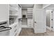 Walk-in closet with custom shelves, drawers, and ample storage, adjacent to a doorway at 331 Terrell Sw Dr, Marietta, GA 30064