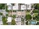 Top down aerial view of a commercial area with tree lined walkways, grass medians, a fountain and parking at 3388 Elgin Dr, Decatur, GA 30032