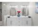 Bathroom with double vanity, stylish mirrors, and chic decor for a spa-like atmosphere at 3388 Elgin Dr, Decatur, GA 30032