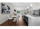 Stylish eat-in kitchen with sleek countertops, stainless appliances, and modern lighting fixtures at 3388 Elgin Dr, Decatur, GA 30032