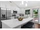 Bright, modern kitchen with stainless steel appliances, white cabinetry, and an inviting island at 3388 Elgin Dr, Decatur, GA 30032