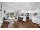 Bright kitchen with stainless steel appliances, island seating, and an open view to the dining area at 3388 Elgin Dr, Decatur, GA 30032